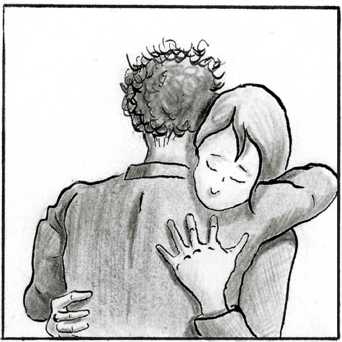 A midshot of Adam and his girlfriend embracing.