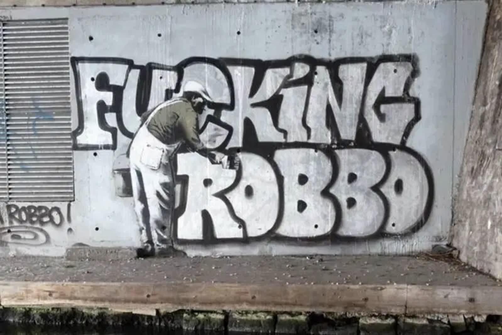 Street art by Banksy on the Regent&rsquo;s Canal, London