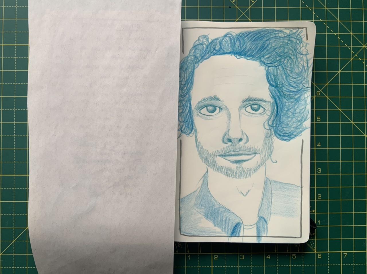 A self portrait in Polychromos pencil by Adam Westbrook