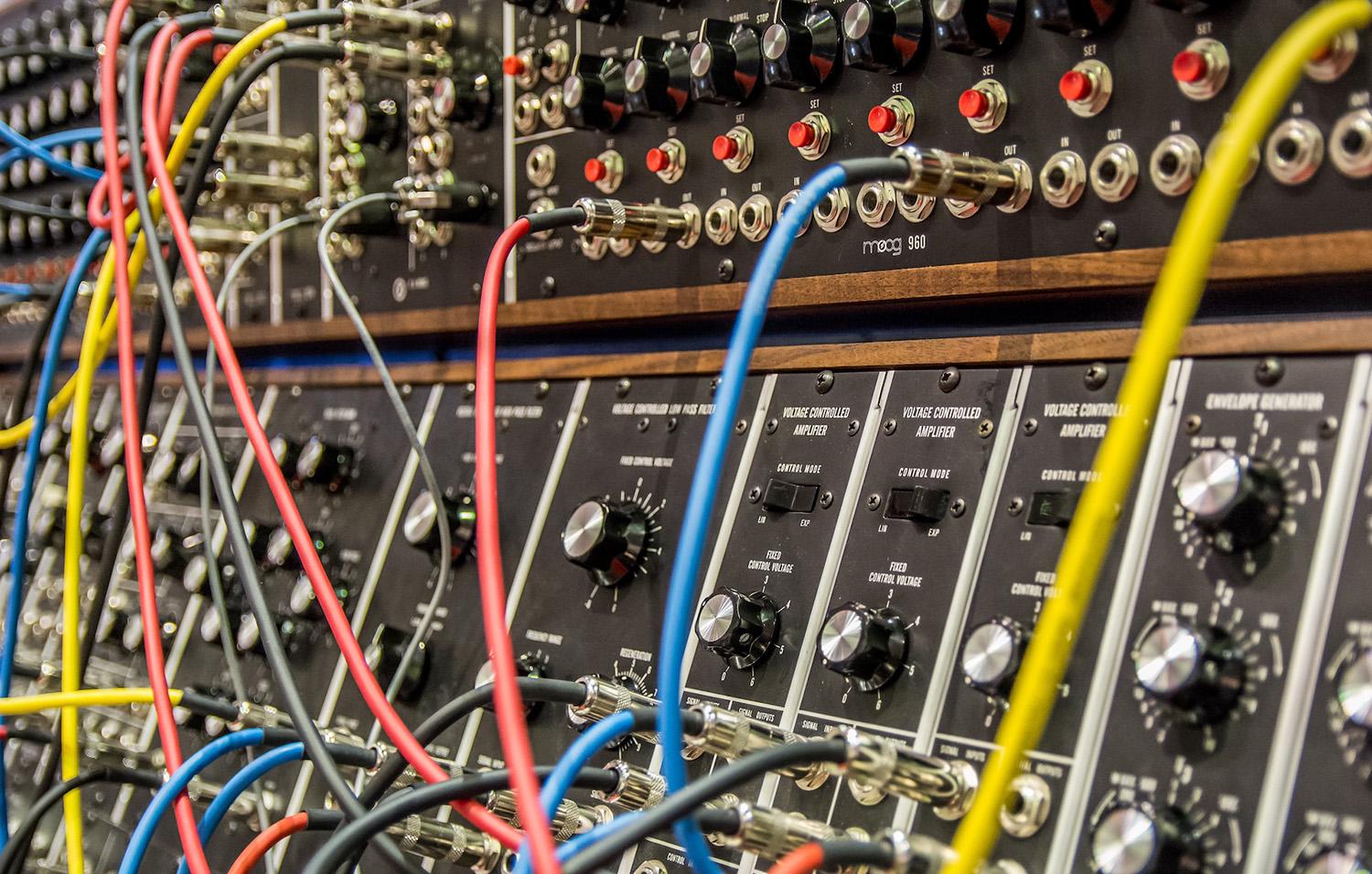 A stock image of an audio patch bay / Photo by Steve Harvey, via Unsplash