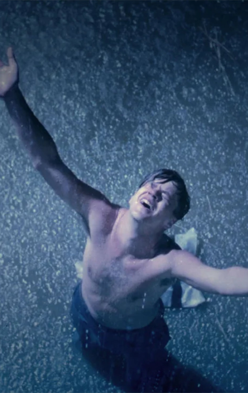 A frame from the movie The Shawshank Redemption, showing the moment of Andy Dufresne's escape.